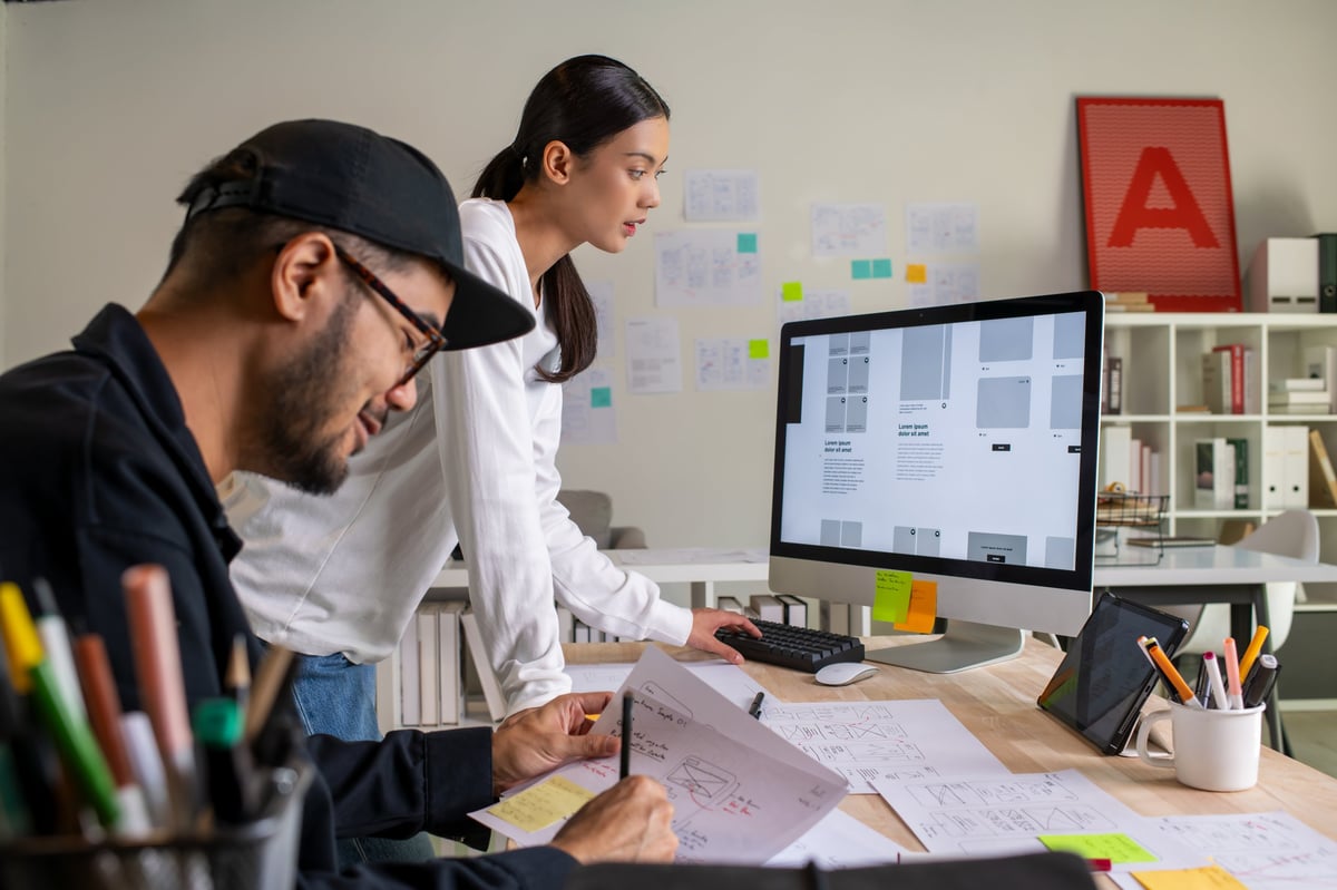 Design team collaborating on web design project